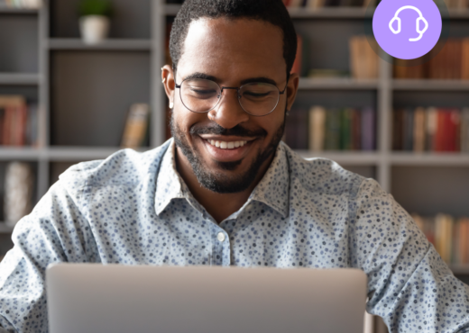 Man with glasses working on laptop, purple circle with white headphones icon