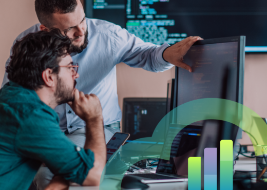 two men looking at a desktop monitor, with an overlay of a blue and green cloud outline and blue and blue, green, and purple bar graph